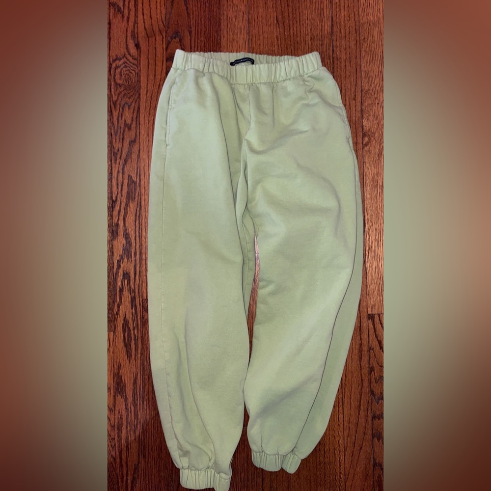 green sweatpants